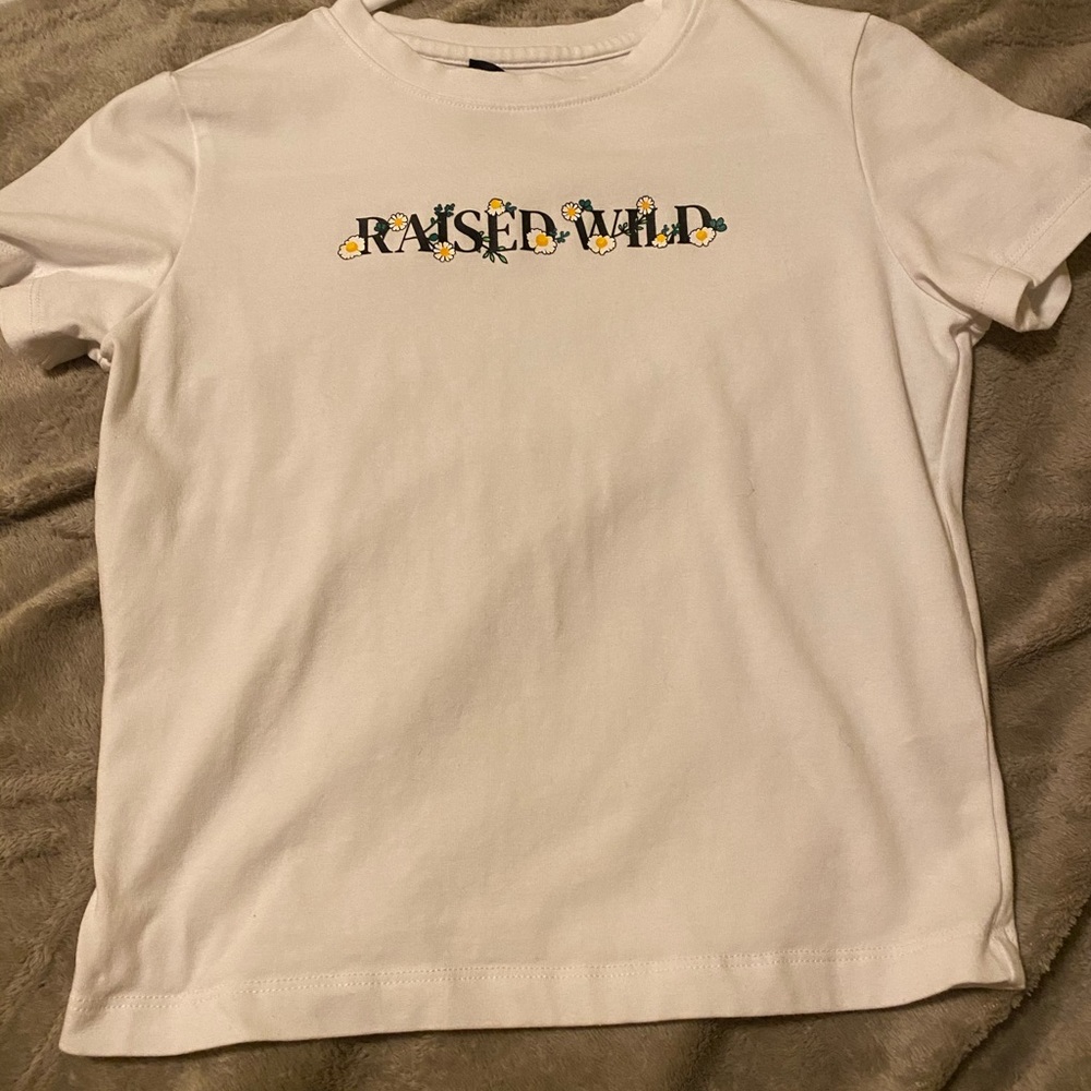 Short sleeve shirt a little cropped not to much.